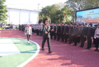 Gelar upacara Hari Bhayangkara ke 80 Bertindak sebagai inspektor upacara Kapolres Sumenep AKBP Anang Hardiyanto, S.I.K.,